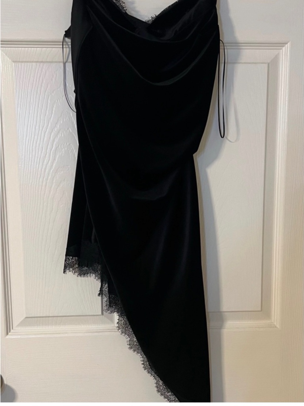 Zara a symmetrical velvet black dress.